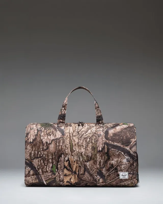 herschel-supply-realtree-novel-duffle-carry-on-bag image 1