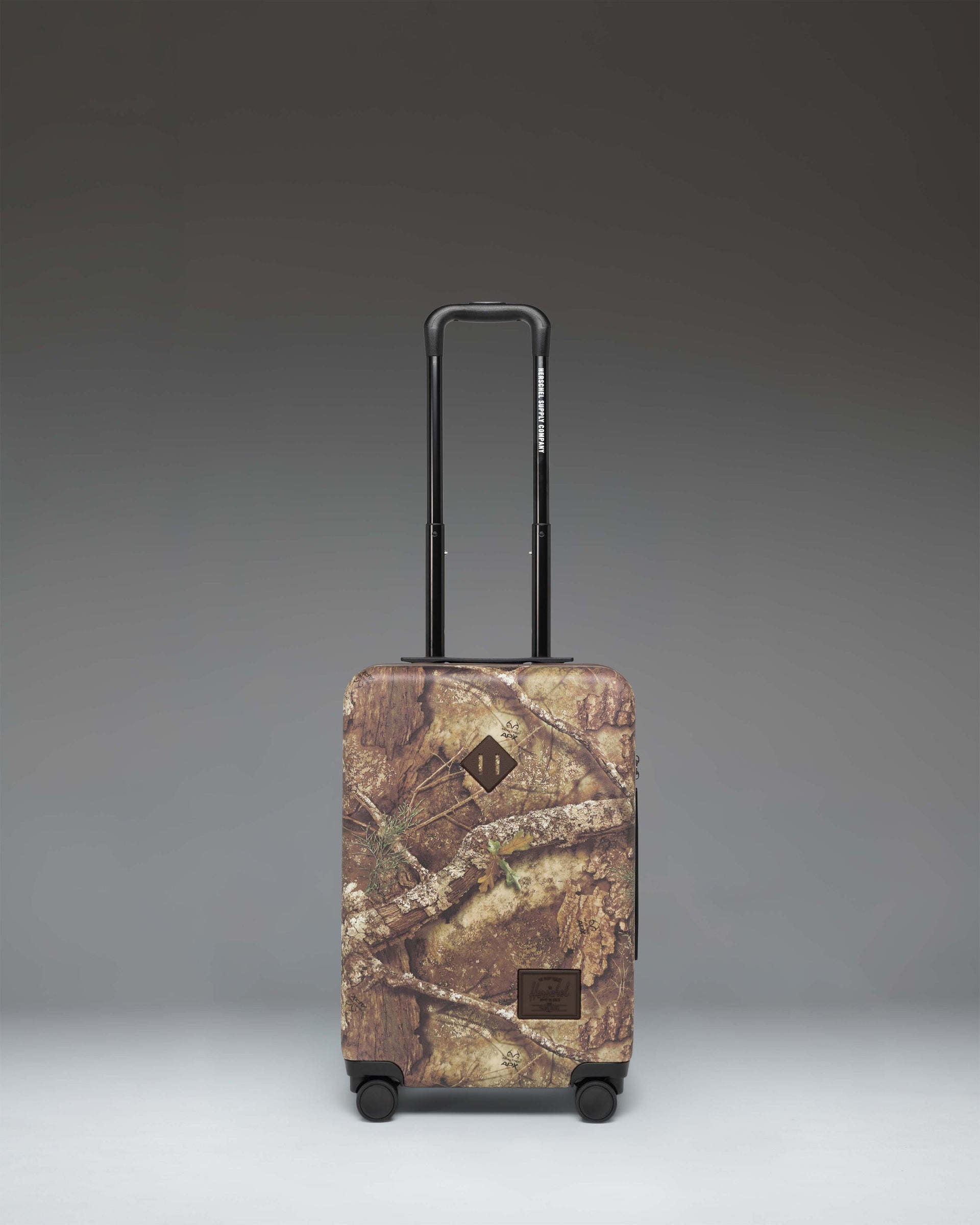 herschel-supply-heritage-large-co-luggage-with-realtree-apx-camo image 1